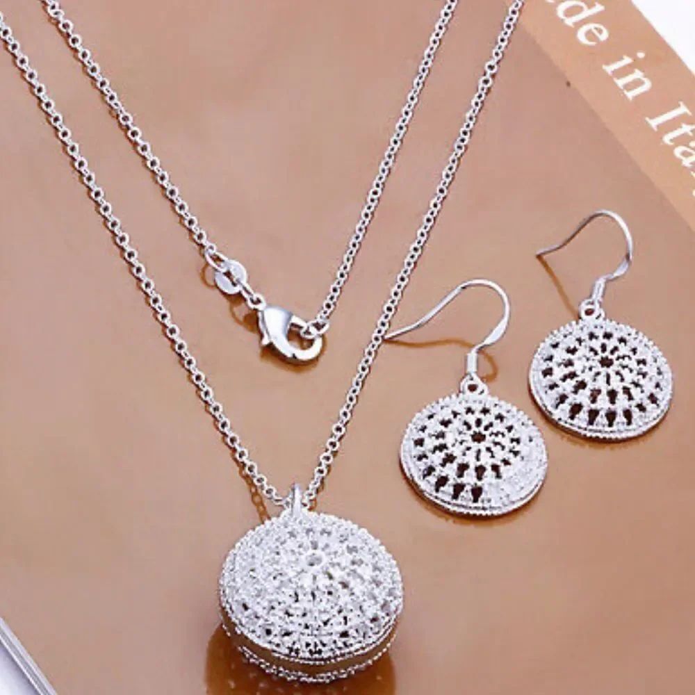The Oracle silver filigree round pendant & earrings set in sterling silver